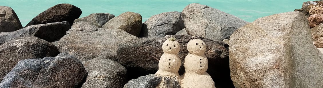 sandy snowman on caribbean coast