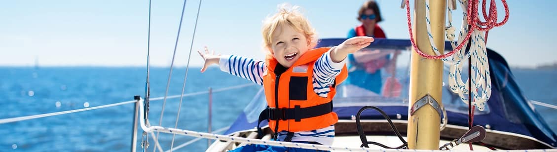 Child sailing on boat
