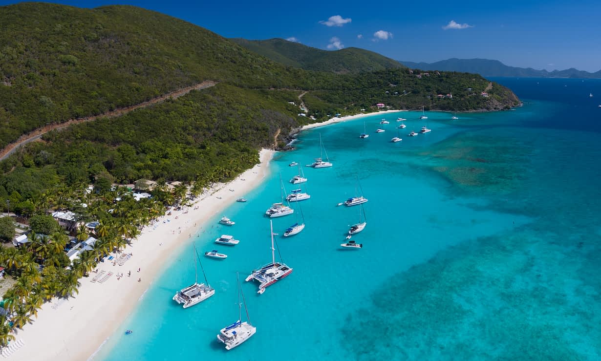 British Virgin Islands Coastline with yacht and bright blue water