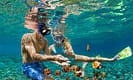 two people snorkeling