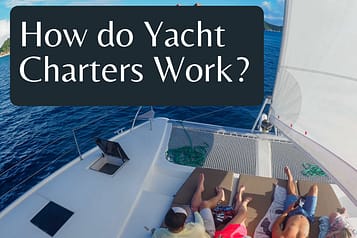 People relaxing on a yacht deck under clear blue skies, exploring how yacht charters operate.