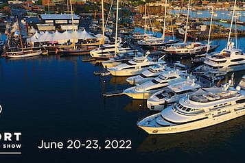 Aerial view of Newport Charter Yacht Show, showcasing luxury yachts in a marina, dated June 20-23, 2022.