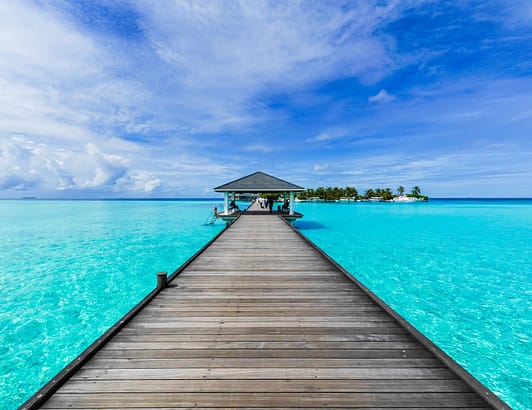 Bora Bora Ariel view bright blue water and island