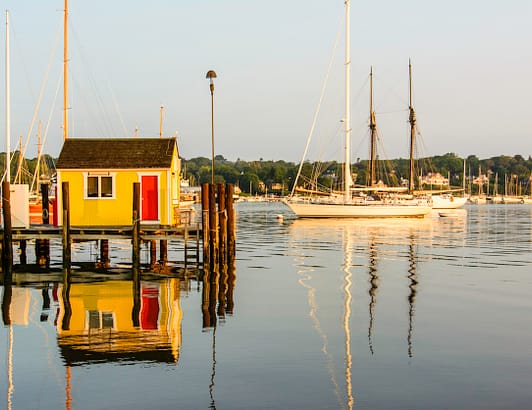 Nantucket harbor with yachts and buildings